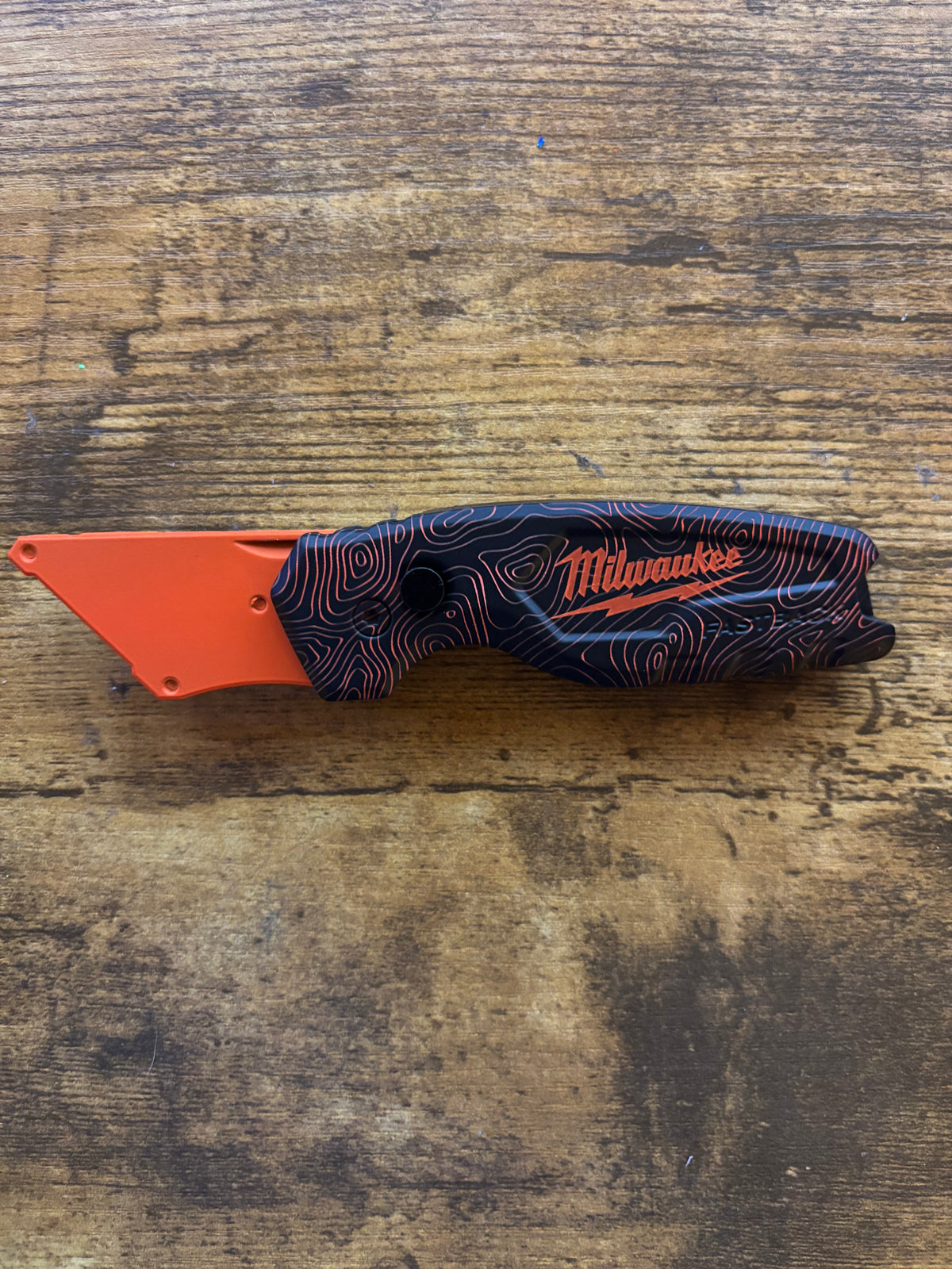 Milwaukee Compact Fastback Orange Black TOPO 1500
