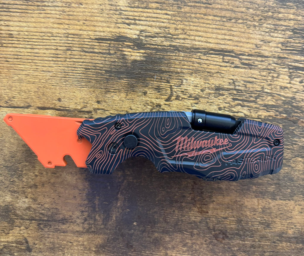 Milwaukee 6in1 Fastback Orange Black TOPO